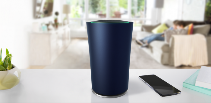 OnHub_on_counter_with_family_in_background.0