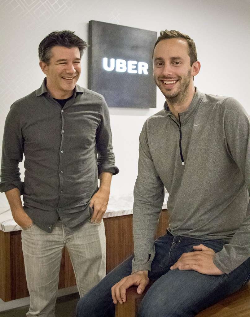 O CEO do Uber Travis Kalanick (esquerda) e Anthony Levandowski