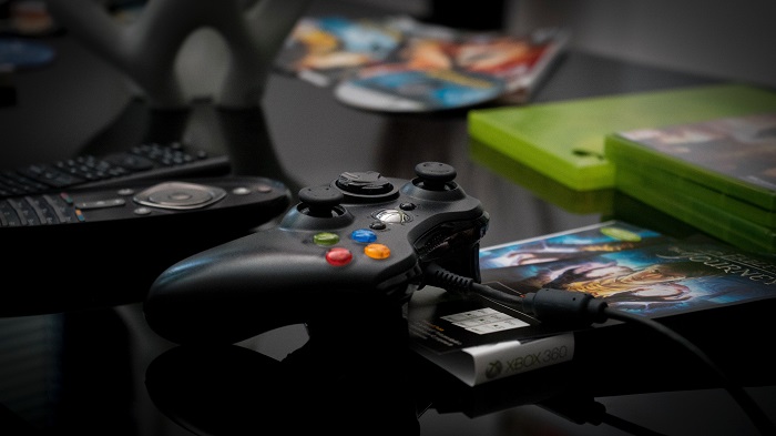 Compra de Xbox 360 usado pode render economia de até 70%, segundo levantamento da OLX (Imagem: Arturo Rey/Unsplash)