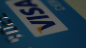 Visa começa a permitir liquidação de pagamentos com criptomoeda
