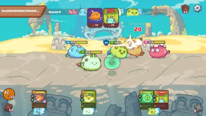 One Axie attacking the other after using a card in Axie Infinity