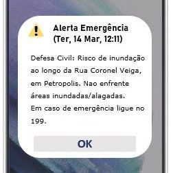 Print de celular com uma mensagem de "Alerta Emergência"