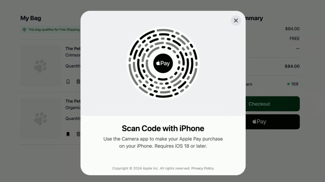 Tela de computador exibindo um código circular para pagamento com Apple Pay