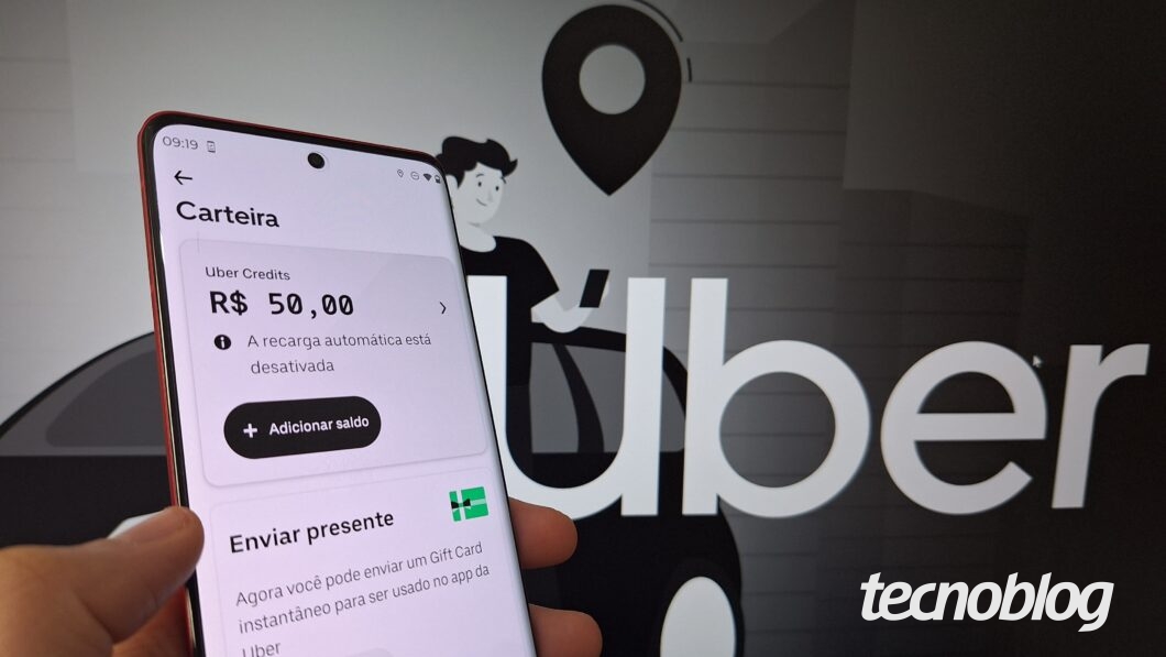 Imagem de um celular com o aplicativo Uber exibindo a tela Uber Credits