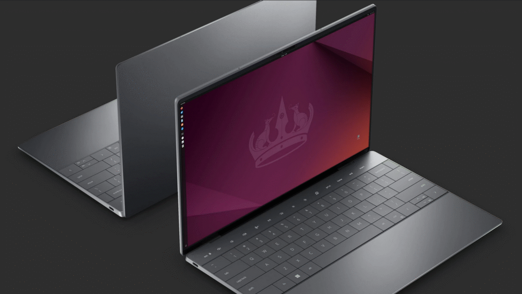 Notebook com o sistema operacional Ubuntu exibindo a área de trabalho com tema escuro e barra lateral