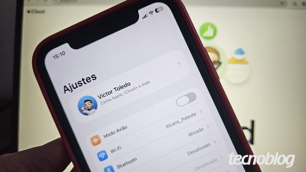 Tela do iPhone com a área Ajustes aberta, mostrando “Conta Apple” para acessar as configurações do iCloud