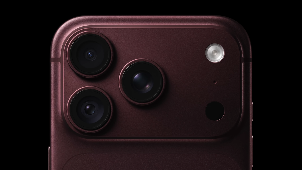 imagem da parte traseira do iPhone 18 Pro com a nova cor vinho. O fundo da imagem é preto